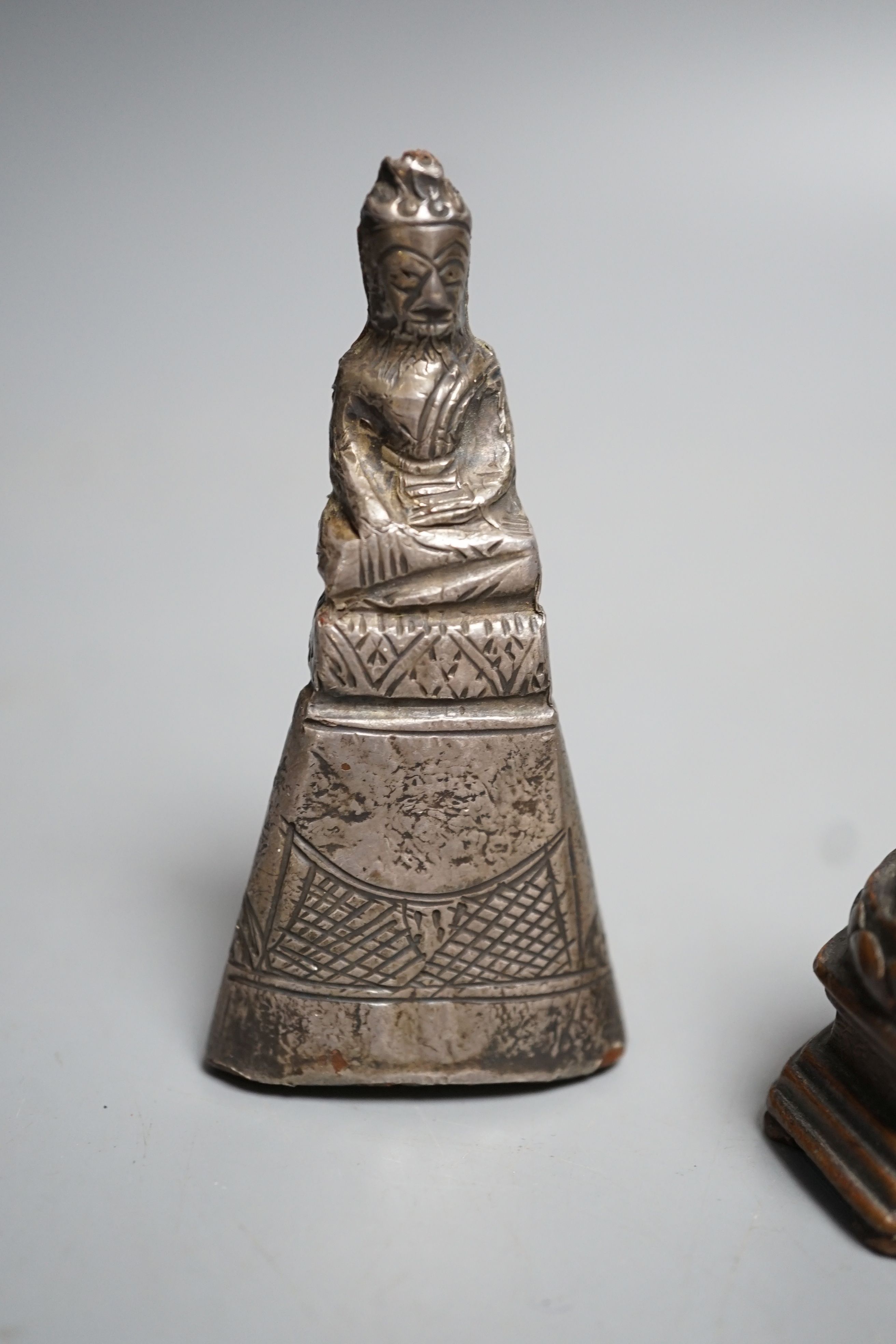 A small 19th century bronze figure of Buddha seated and a Burmese silver overlaid wood figure of Buddha, largest 7.5cm